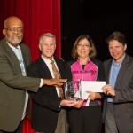 Ralph Moore presenting Urban Health Institute Henrietta Lacks Award