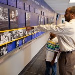 Lacks family viewing Henrietta Lacks tile in Johns Hopkins Hospital